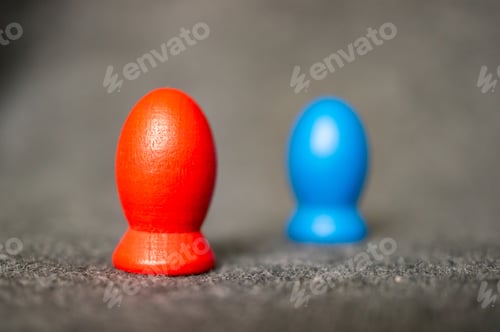 Preview: A Closeup Of Blue And Red Wooden Figures