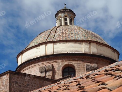 Preview: A Beautiful View Of A Facade Of An Ancient Building Under A Cloudy Sky