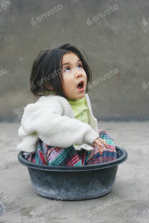 Preview: Little Latin Girl With Surprised Facial Expression.