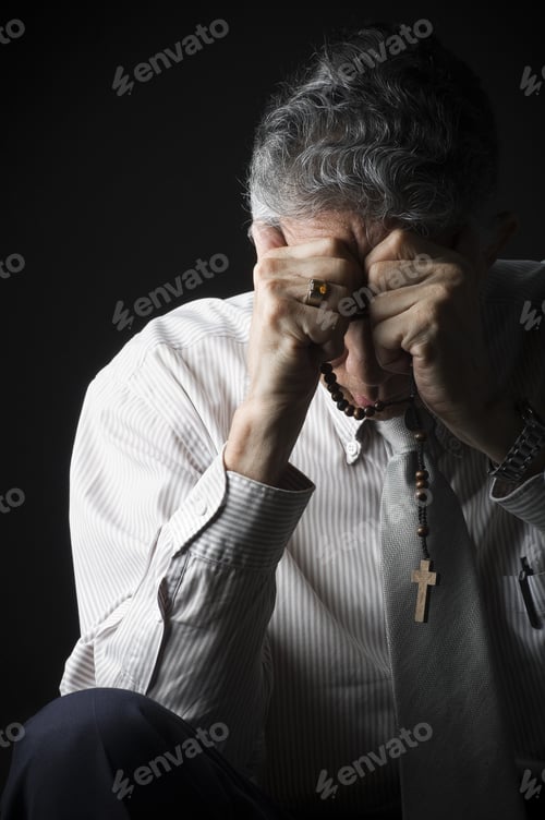 Preview: A Sad Desperate Man Praying, Low Key Setting.