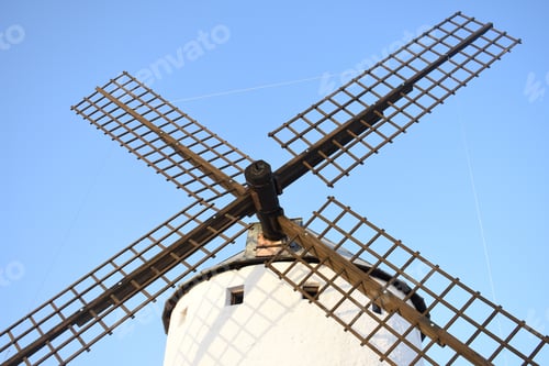 Preview: A Windmill Against The Blue Sky On A Sunny Day