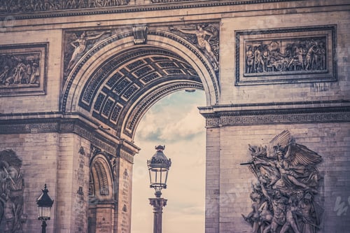 Preview: A Low Angle Shot Of A Street Light Near The Arch Of Triumph In Paris, France