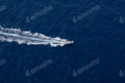 Preview: A High Angle Shot Of A Motorboat Sailing On The Surface Of The Sea