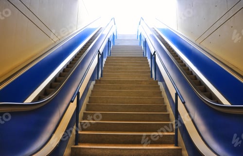 Preview: A Staircase And Two Escalators Under The Lights In A Building