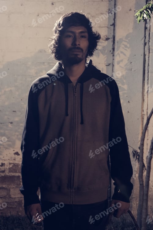 Preview: Portrait Of Young Man With Beard Wearing Shirt And Shades Of Trees In The Park