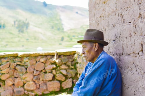 Preview: Serious Native American Old Man With Walking Stick In The Countryside.