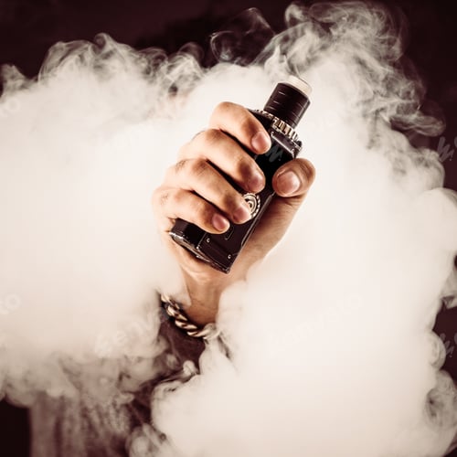 Preview: Hand Of Man Soars On The Smoke With Mod In A Black Background. Vape Concept