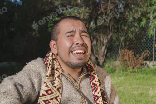 Preview: Musician Holds Guitar . A Closeup Portrait Of A Sacred Man With Traditional Clothes