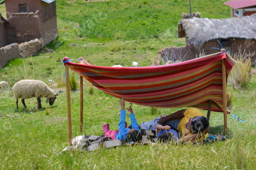 Preview: Happy Latin Man With His Two Little Children Having Good Time In The Hovel Made Of Clothing