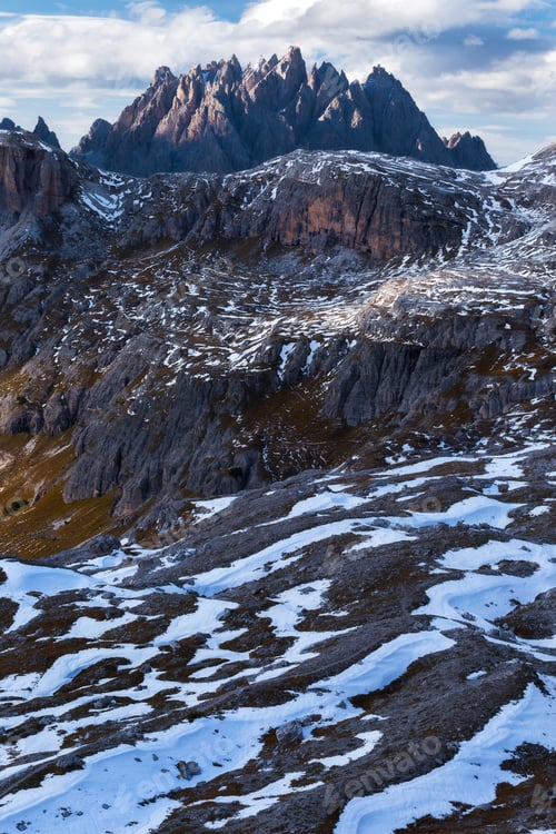 Preview: A Vertical Shot Of The Mountain Rocca Dei Baranci In Italian Alps Under The Cloudy Sky