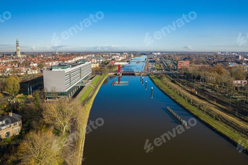 Preview: A High Angle Shot Of A Lake In The Middle Of City Buildings In Middelburg, Netherlands.