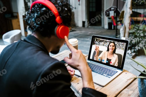 Preview: Back View Of Business Latin Man Talking To Her Mexican Colleagues In Video Conference Business Team