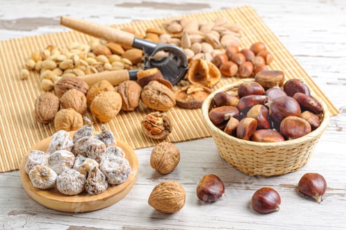 Preview: A Closeup Shot Of Various Delicious Shelled Nuts On A Kitchen Table