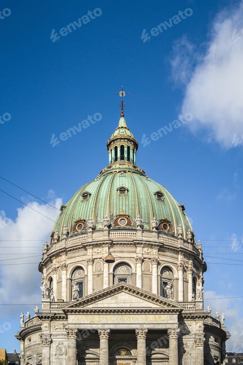 Preview: A Vertical Shot Of The Frederik'S Church Under The Blue Sky Captured In Copenhagen, Denmark