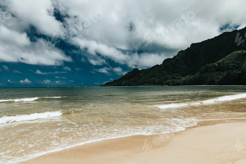 Preview: The Breathtaking View Of The Ocean And The Beach Under The Beautiful Clouds In The Sky
