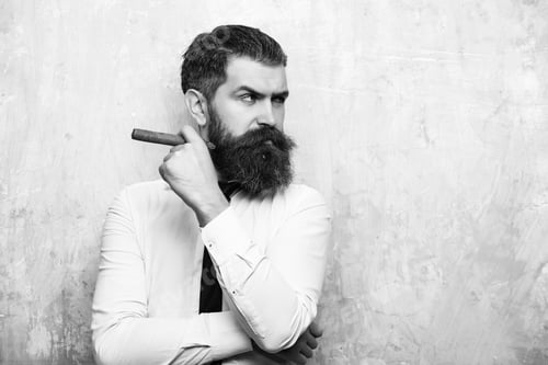 Preview: Bearded Man Or Hipster With Long Beard And Stylish Hair On Serious Face In Tie And White Shirt On