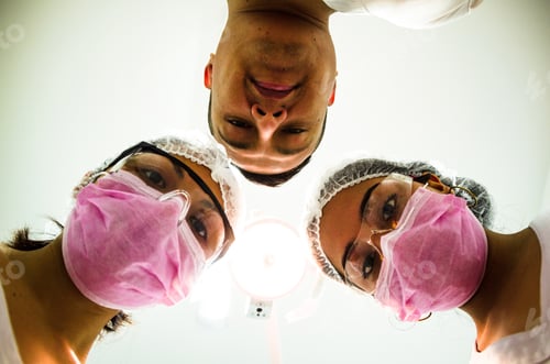 Preview: Portrait Of Three Surgeons At Work, Operating In Uniform, Looking At The Camera