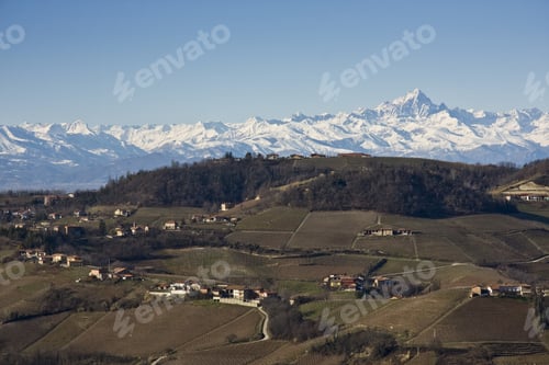Preview: A Breathtaking Shot Of The Houses Among The Greenery With The Background Of The Snow-Capped