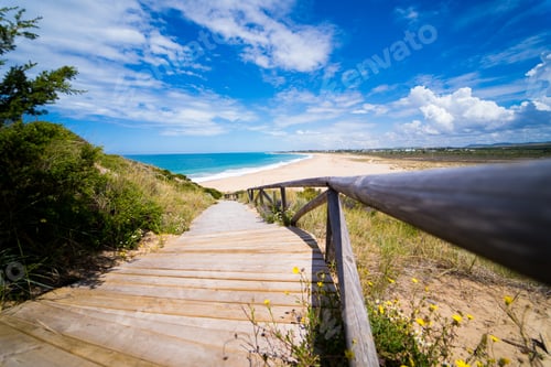 Preview: A Seascape Of Coast, A Wooden Pathway Toward It And The Sky With Some Clouds