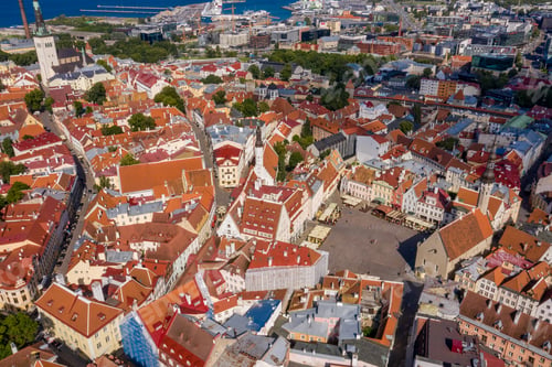 Preview: A Drone View Of The Tallinn Old Town Surrounded By Buildings And Greenery In Estonia