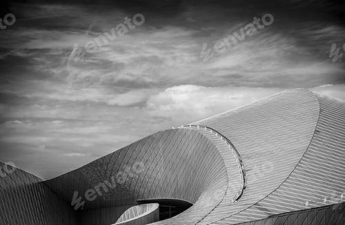 Preview: A Gray Scale Shot Of A Dome Shaped Building Under The Cloudy Skies