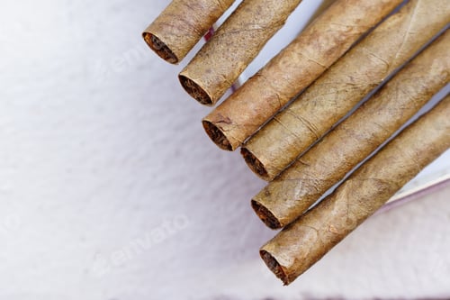 Preview: A Closeup Shot Of Some Small Cigars