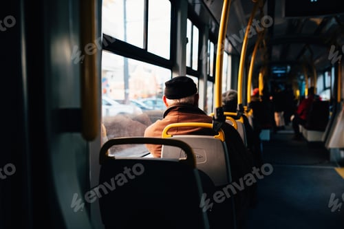 Preview: The Interior Of A City Bus With Yellow Holding Rails