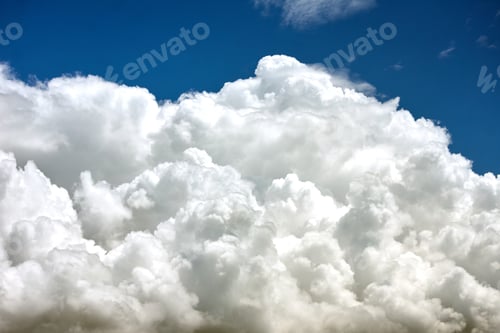 Preview: A Mesmerizing Shot Of A Bright Blue Sky With Clouds