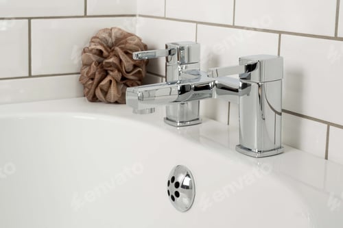 Preview: A Closeup Shot Of The Faucet And Bathroom Sink