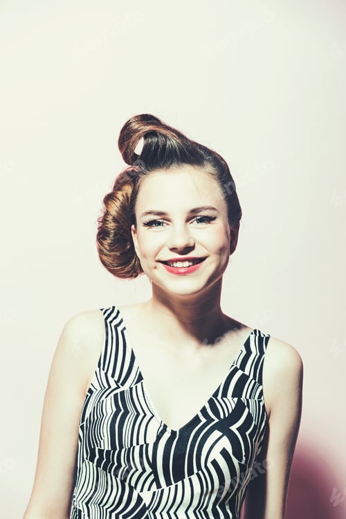 Preview: Girl In Stylish Vintage Dress On Pink Background. Woman With Retro Hair And Fashionable Makeup