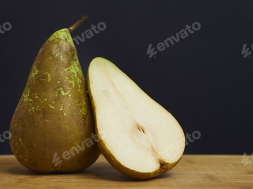 Preview: A Closeup Shot Of Half-Cut Of Juicy Pear
