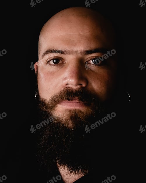 Preview: Photography In Studio With Black Background Of A Bald Hipster Man With Long Beard.