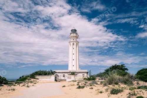 Preview: The Lighthouse At Cape Trafalgar Los Spain And The Cloudy Sky In The Background