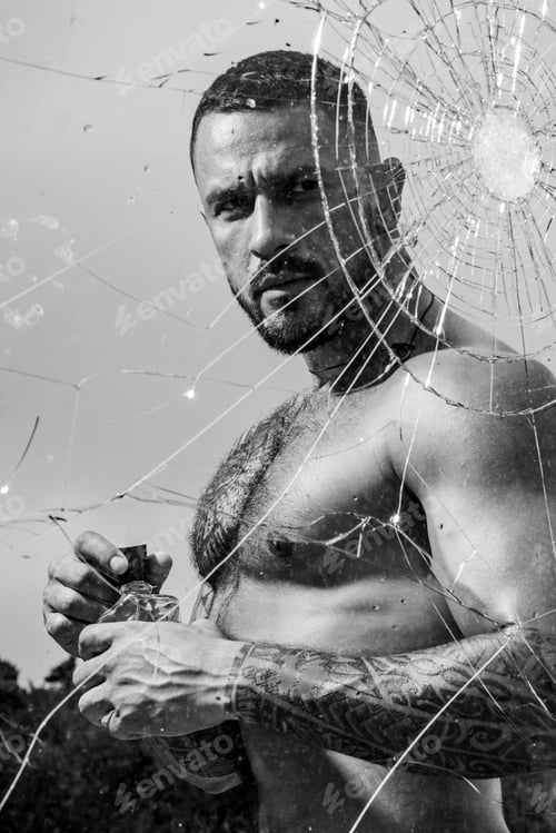 Preview: Mental Problem. Bullet Hole In Glass. Broken Glass Because Of Hit. Sexy Hispanic Man Broken Mirror