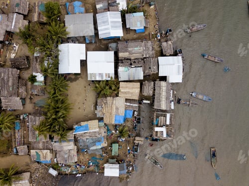 Preview: An Aerial Shot Of Buildings Near The Boats On The Water
