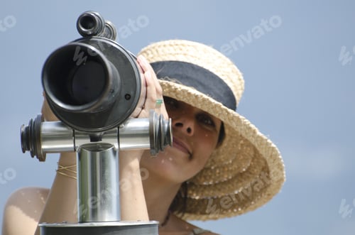 Preview: A Female In A Straw Hat Watching With A Telescope