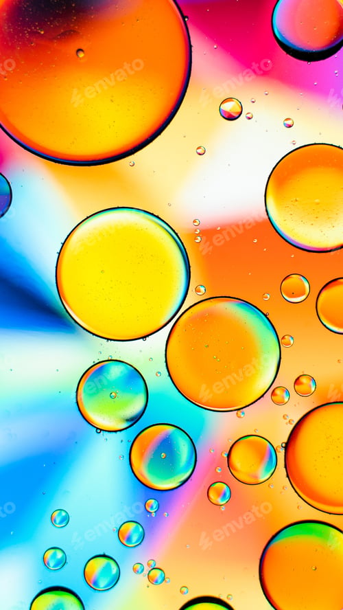 Preview: A Vertical Macro Shot Of Different Sized Bubbles On A Colorful Background