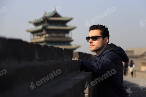 Preview: Traveler Man At The Ancient City Of Ping Yao (Unesco World Heritage Site). A Famous Historic Site