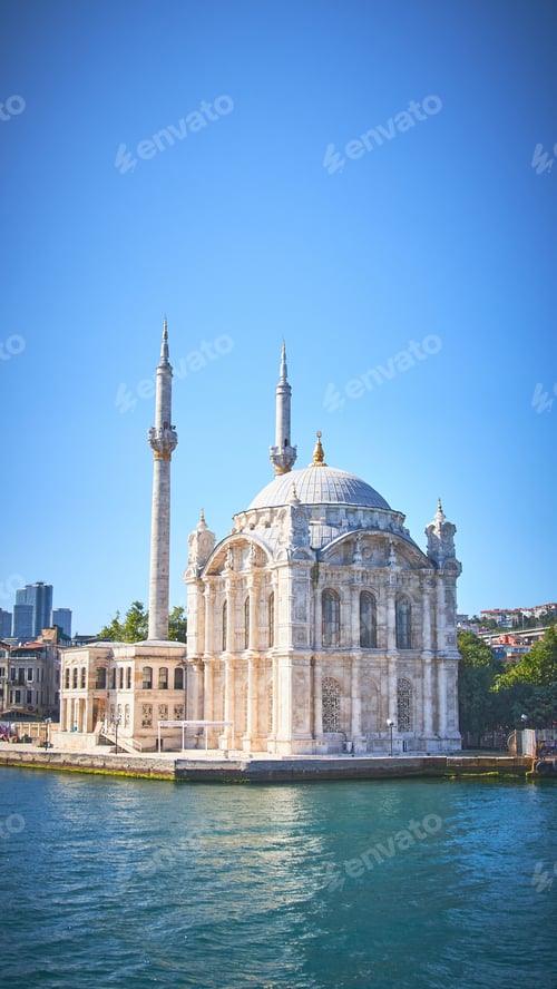 Preview: A Vertical Shot Of The Ortakoy Mosque With A Blue Sky In The Background