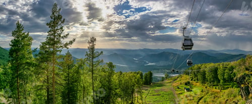 Preview: A Beautiful Panoramic Shot Of Cableway Over A Forest