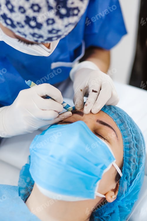 Preview: Latin Cosmetologist Preparing To Mexican Woman For Eyebrow Permanent Makeup Procedure In Mexico