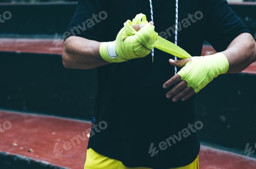 Preview: Boxer Bandages Around Their Arms Ready To Fight