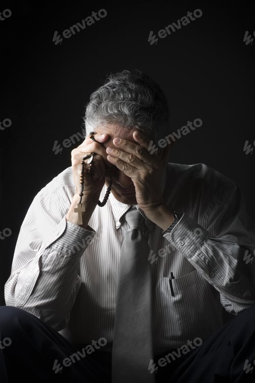 Preview: A Sad Desperate Man Praying, Low Key Setting.