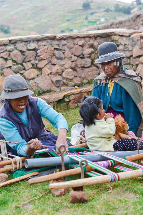 Preview: Three Generations Of Native American Women In The Countryside Weaving Authentic Aymara Cloth.