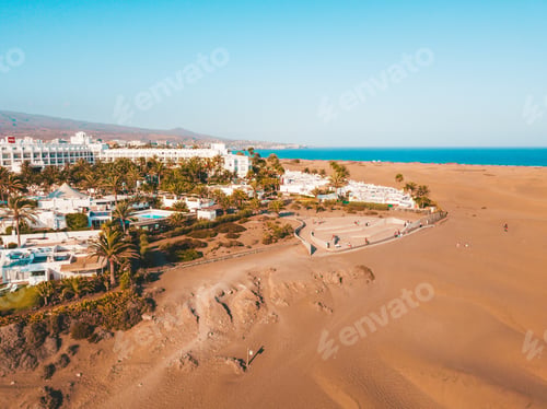 Preview: A Aerial View Of Maspalomas Dunes On Gran Canaria Island With Exotic Palm Trees And Cool Buildings