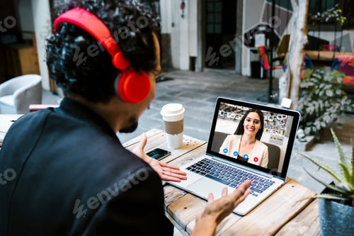 Preview: Back View Of Business Latin Man Talking To Her Mexican Colleagues In Video Conference Business Team