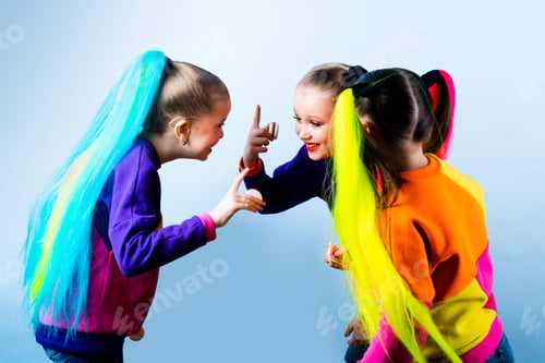 Preview: Indoor Shot Of Joyful Attractive Girls Standing And Having A Conversation Between Lessons, Laughing