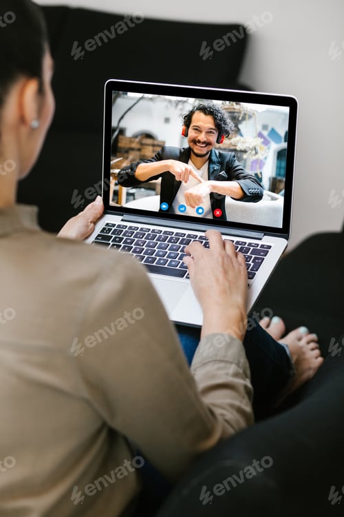 Preview: Back View Of Business Latin Woman Talking To Her Mexican Colleagues In Video Conference Business