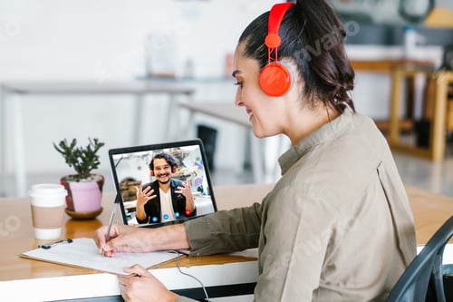 Preview: Back View Of Business Latin Woman Talking To Her Mexican Colleagues In Video Conference Business