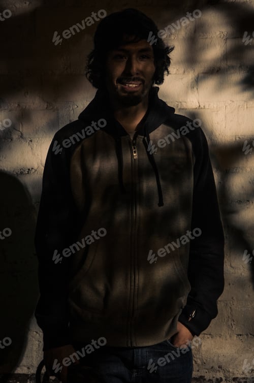 Preview: Portrait Of Young Man With Beard Wearing Shirt And Shades Of Trees In The Park